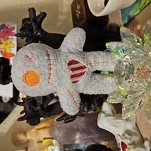 Voodoo poppet pincushion.
